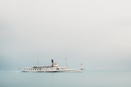 white ship on body of water thumbnail