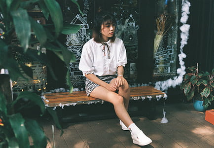 woman sitting on bench thumbnail