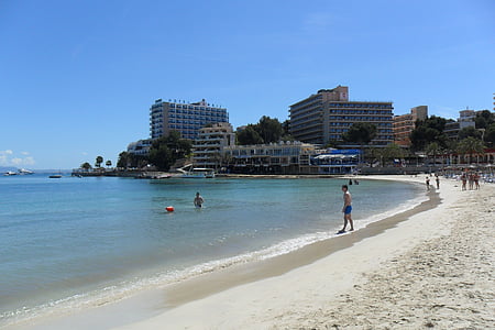 man standing beside seashore thumbnail