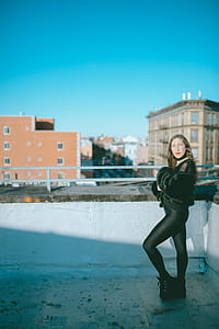 woman standing on floor thumbnail