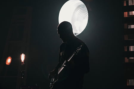 man holding electric guitar thumbnail