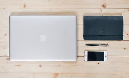 silver MacBook with iPhone 5s and click pen thumbnail