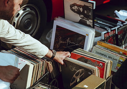 person getting vinyl sleeves thumbnail