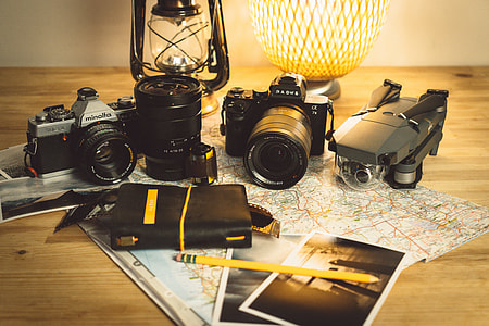 two DSLR camera on top of table thumbnail