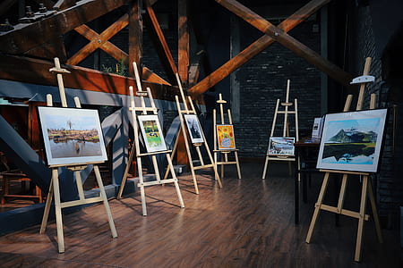 assorted painting on wooden easel thumbnail