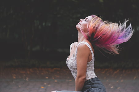 selective focus photography of woman in white tank top thumbnail