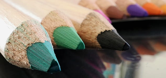 selective focus photography of color pencils thumbnail