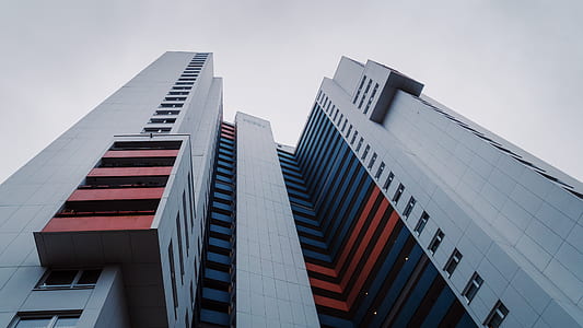 low-angle photography of gray building thumbnail