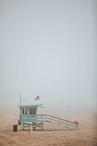 green wooden lifeguard house thumbnail