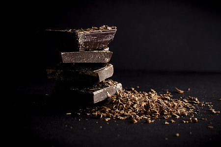 pile of black dark chocolate bars thumbnail