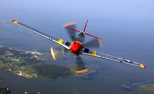 gray propeller plane during daytime thumbnail