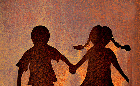 silhouette of boy and girl holding hands illustration thumbnail