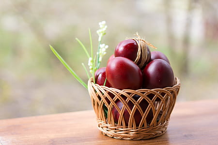 green balls on round brown wicker basket thumbnail