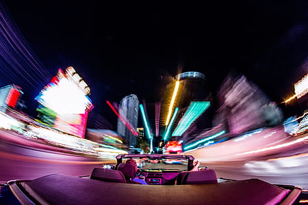 selective focus photography of black convertible thumbnail