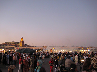 people gathered in area with fire thumbnail