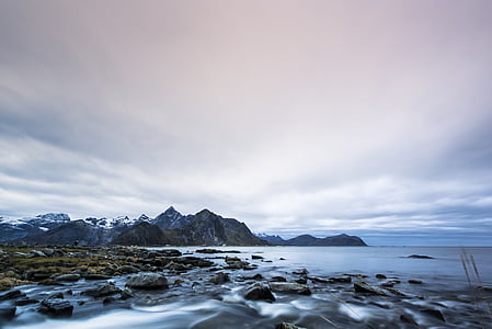 mountain near body of water thumbnail