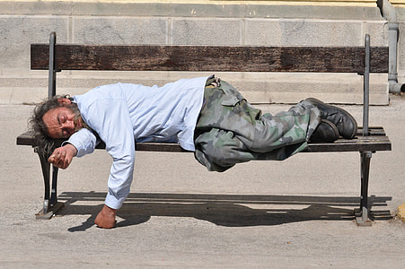 man sleeping on the bench thumbnail
