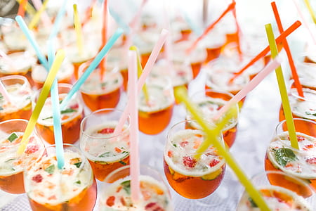 selective focus photo of clear glass drinking glasses with straw thumbnail