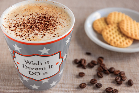 coffee on cup and cookies on plate thumbnail