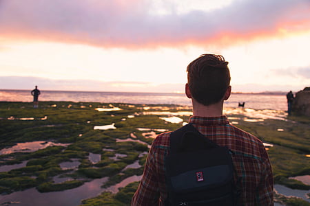 man looking at the sunset thumbnail