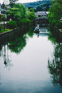 two persons riding on boat thumbnail