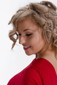 woman wearing red top smiling thumbnail