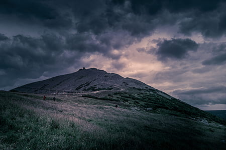 scenery of mountain under cloudy sky thumbnail
