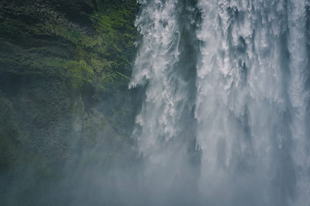green leafed trees beside waterfalls thumbnail