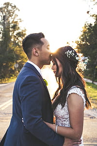 man kissing woman's forehead thumbnail