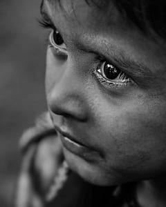 greysacle photo of child's face thumbnail