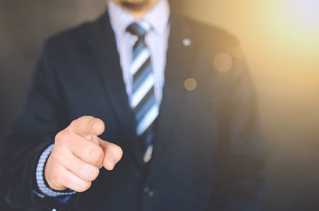 Close Up Photo of a Person Wearing Suit Jacket thumbnail