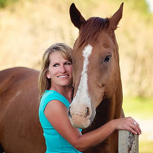 photograph of woman in teal top thumbnail