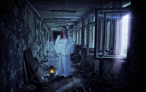 woman in white dress standing near window inside room thumbnail