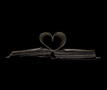 white and brown opened book thumbnail