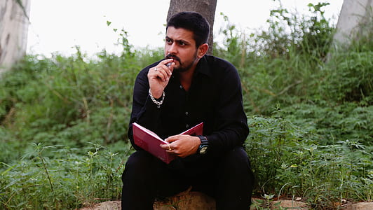 man reading book thumbnail