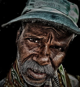 man wearing grey cap close-up photo thumbnail