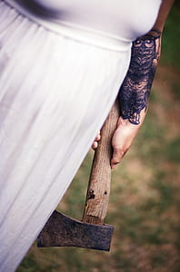 woman holding axe thumbnail