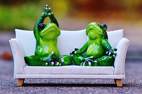 two ceramic frog figurines on white couch model scale thumbnail