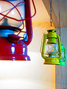 Three Red, Yellow, and Green Gas Lantern Hanging on Ceiling thumbnail