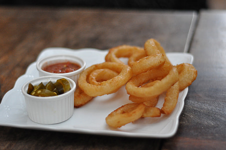 curly fries on square white plate thumbnail