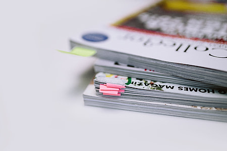 Stack of white magazines with copy space thumbnail