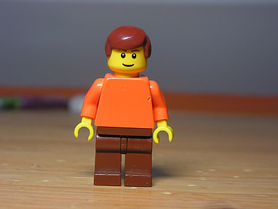 orange dressed Lego toy thumbnail