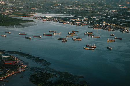 Aerial Photography of Ships on Body of Water thumbnail