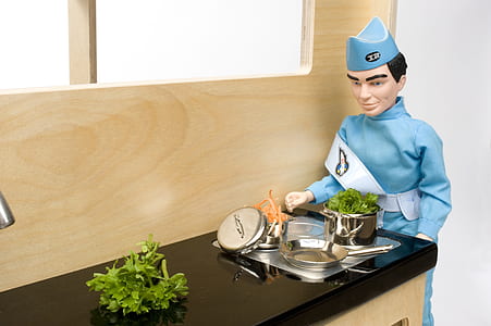 doll wearing blue uniform thumbnail