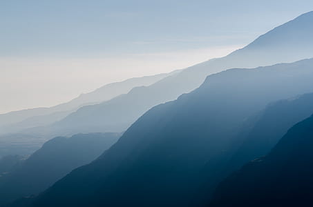 mountain covered with fogs during daytime thumbnail