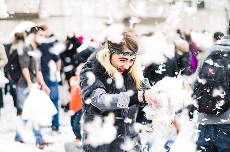 woman playing on the snow thumbnail