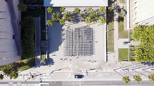 aerial photography of people walking near building thumbnail