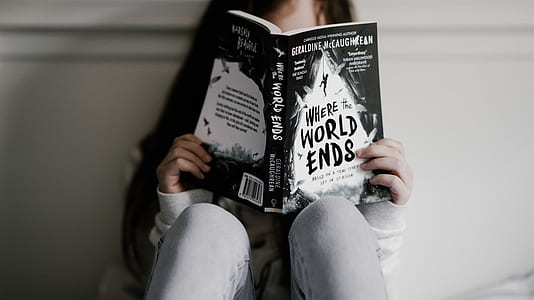 girl reading Where the World Ends book thumbnail
