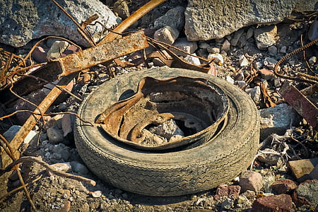 rusted vehicle wheel with tire thumbnail