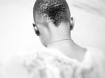 view back of person's head grayscale photo thumbnail